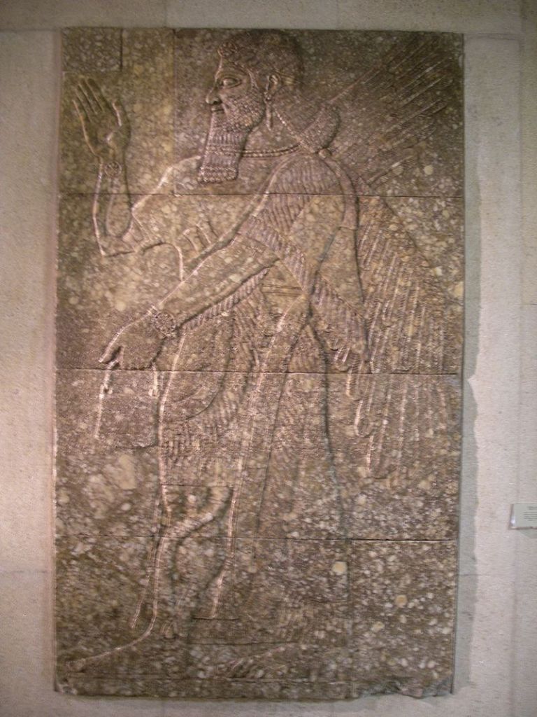 Winged genie from the Nimrud palace of Ashurnasirpal II. Museu Calouste Gulbenkian, Lisbon.