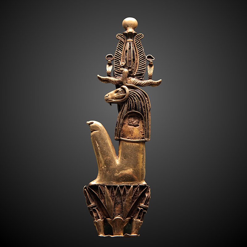 Gold amulet in the form of Heryshaf seated on a lotus, c. 1069–332 BC. Louvre.