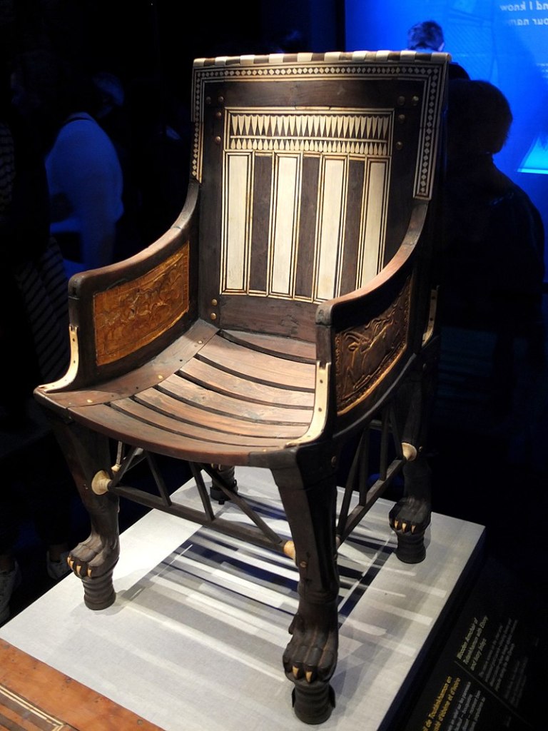 Armchair of Tutankhamun, c. 1336–1326 BC, wood, ebony, ivory and gold leaf. Egyptian Museum, Cairo.