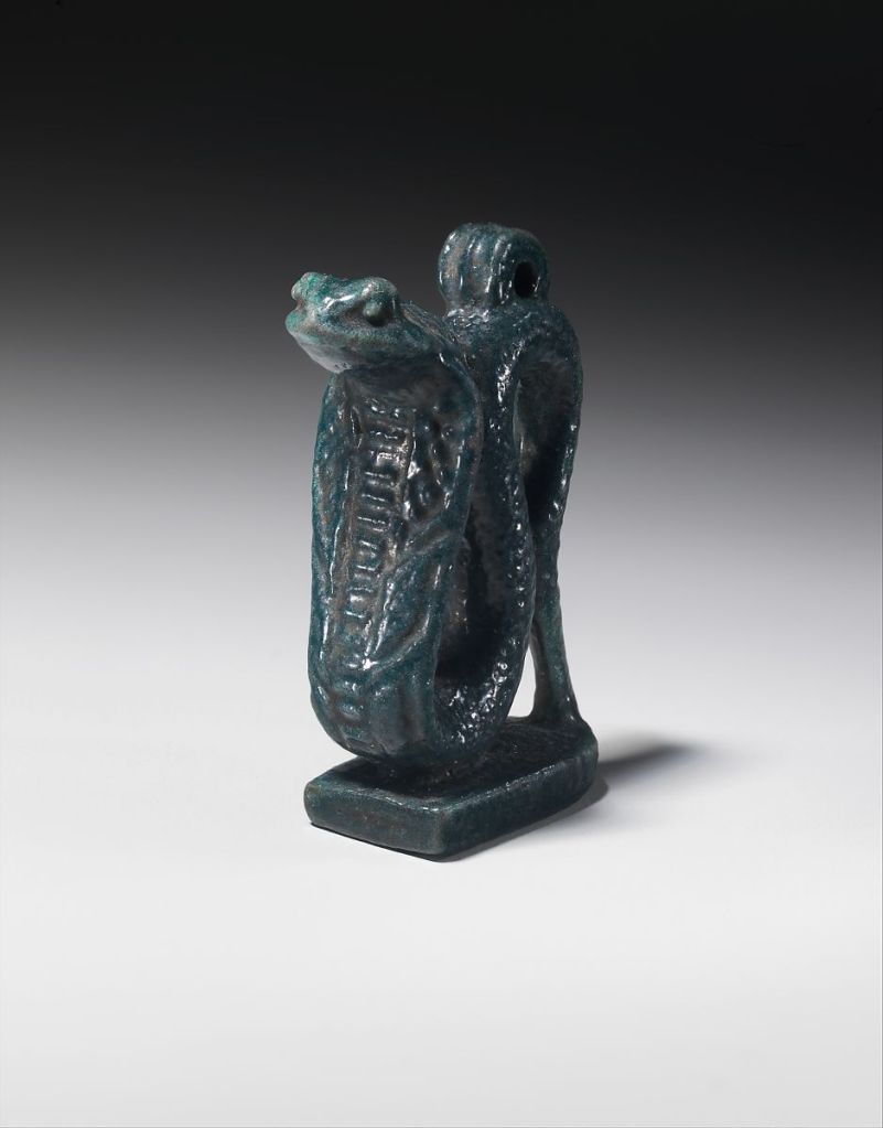 Faience amulet of the goddess Wadjyt as a cobra, 664–332 B.C. Metropolitan Museum of Art.