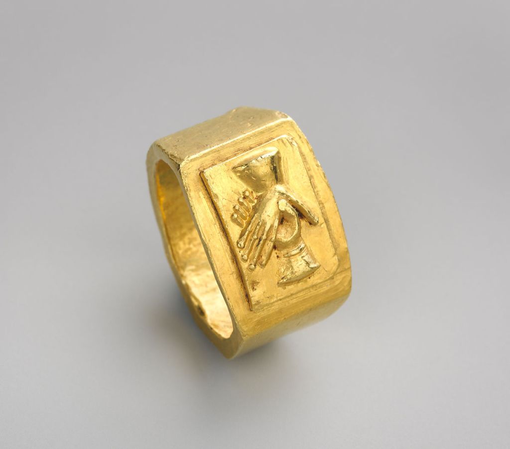 Gold ring with clasped hands, 3rd c. AD. This would have been used as a wedding band.